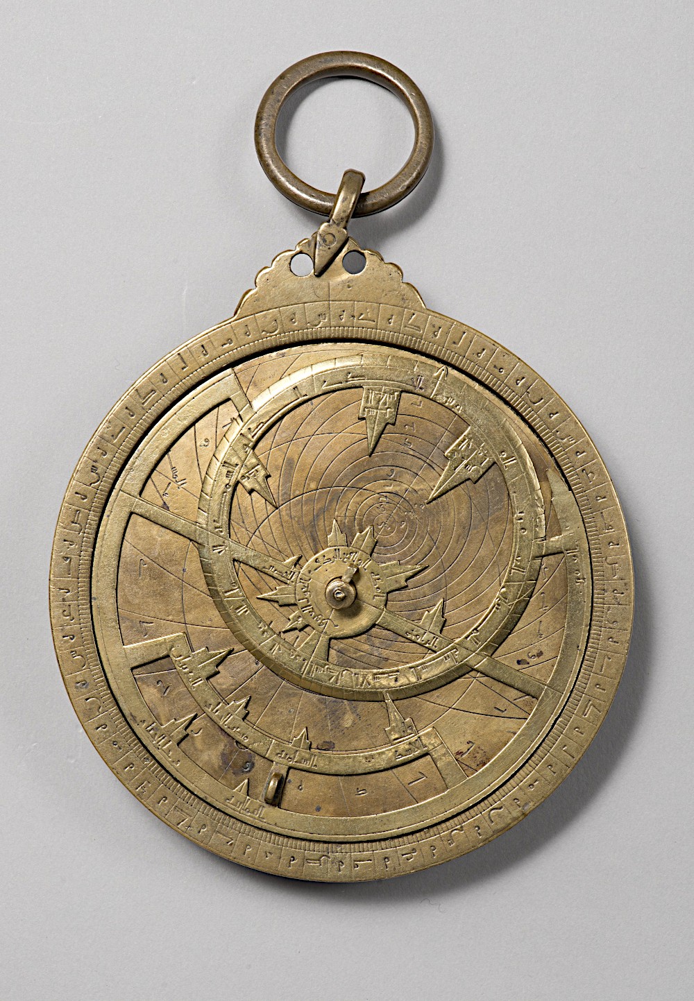Astrolabe constructed by Ahmad ibn Khalaf of Djaraf, son of Moktafi Billah, 294-377 AH (905-987 CE). Bibliothèque nationale de France, GE A-324. 13 x 19 cm. Public domain